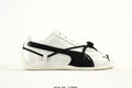 PUMA White & Black Low-Top Sneakers with Cross-Detail Accents