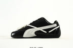 PUMA Black & White Low-Top Sneakers with Cross-Detail Accents