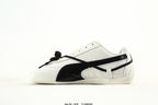 PUMA White & Black Low-Top Sneakers with Cross-Detail Accents