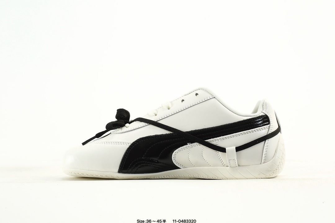 PUMA White & Black Low-Top Sneakers with Cross-Detail Accents