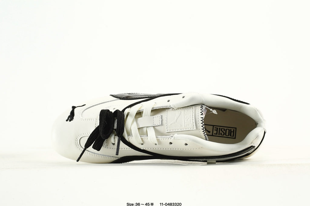 PUMA White & Black Low-Top Sneakers with Cross-Detail Accents