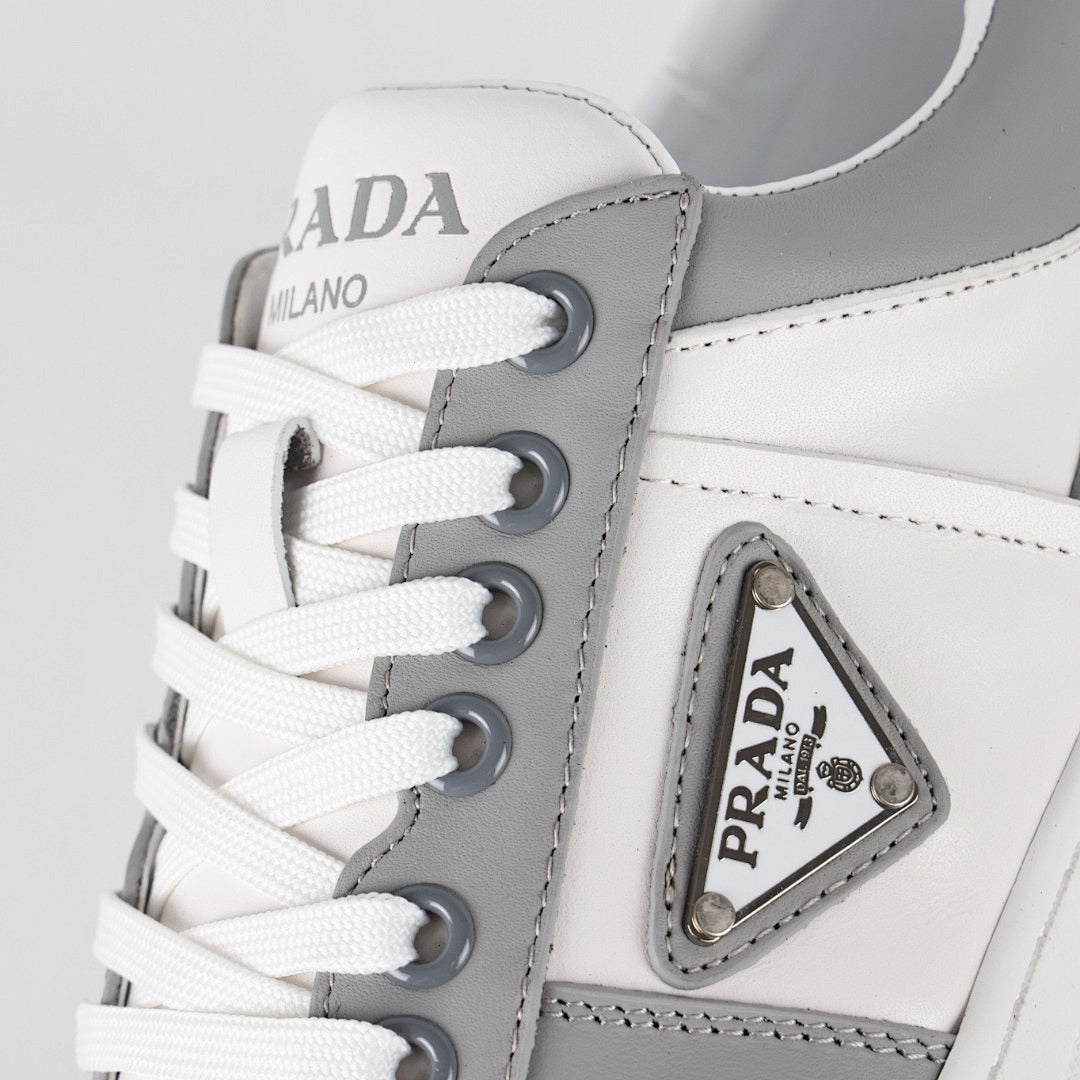 Prada Gray & White Low-Top Sneakers