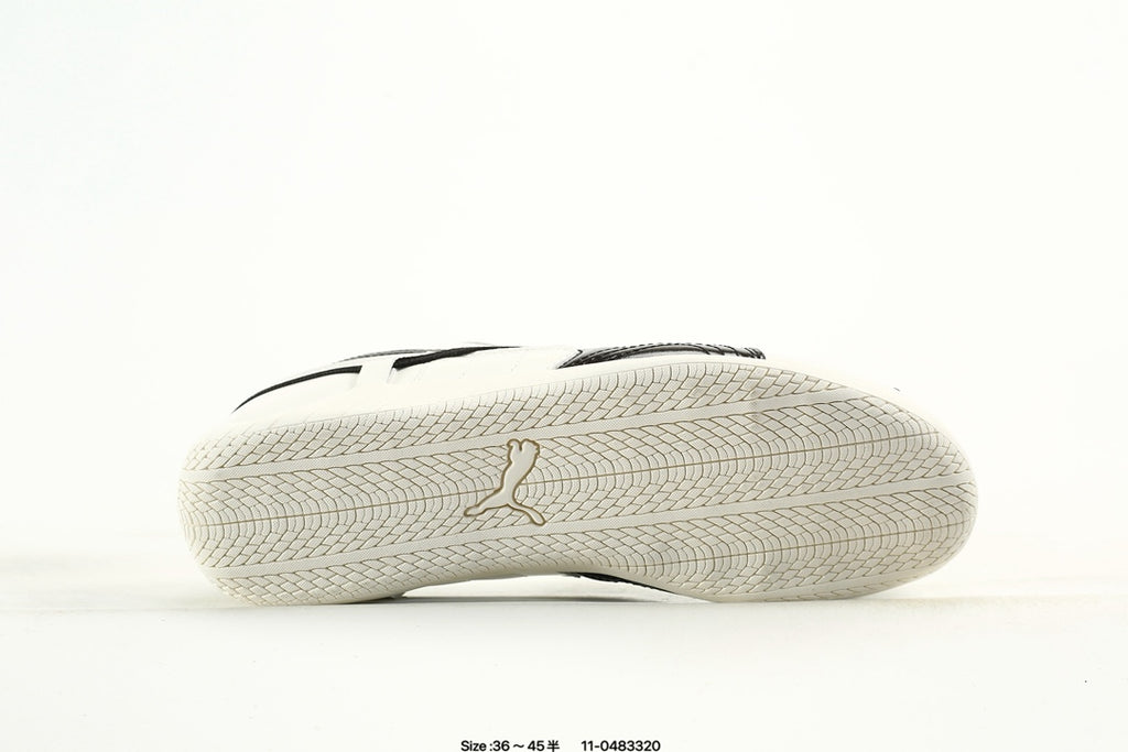 PUMA White & Black Low-Top Sneakers with Cross-Detail Accents