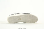 PUMA White & Black Low-Top Sneakers with Cross-Detail Accents