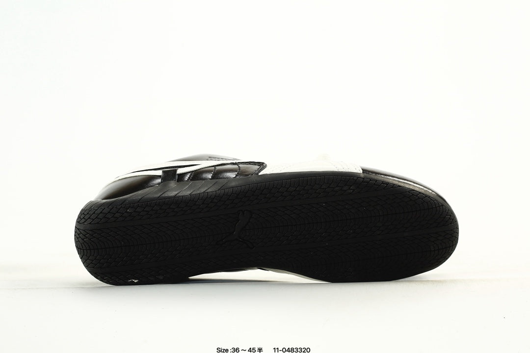 PUMA Black & White Low-Top Sneakers with Cross-Detail Accents